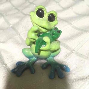 Pottery frog and tadpole