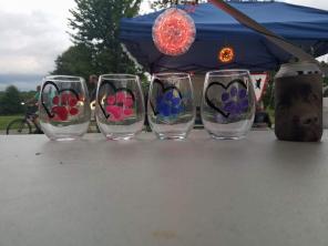 Hand painted paw print wine glasses.