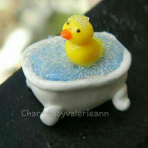 Rubber duckie in a tub